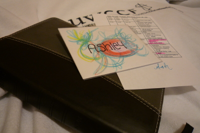 Bible, name tag and schedule